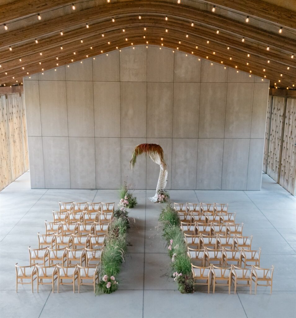Elegant wedding setup with floral decorations at Gather Green in Upstate, NY.
