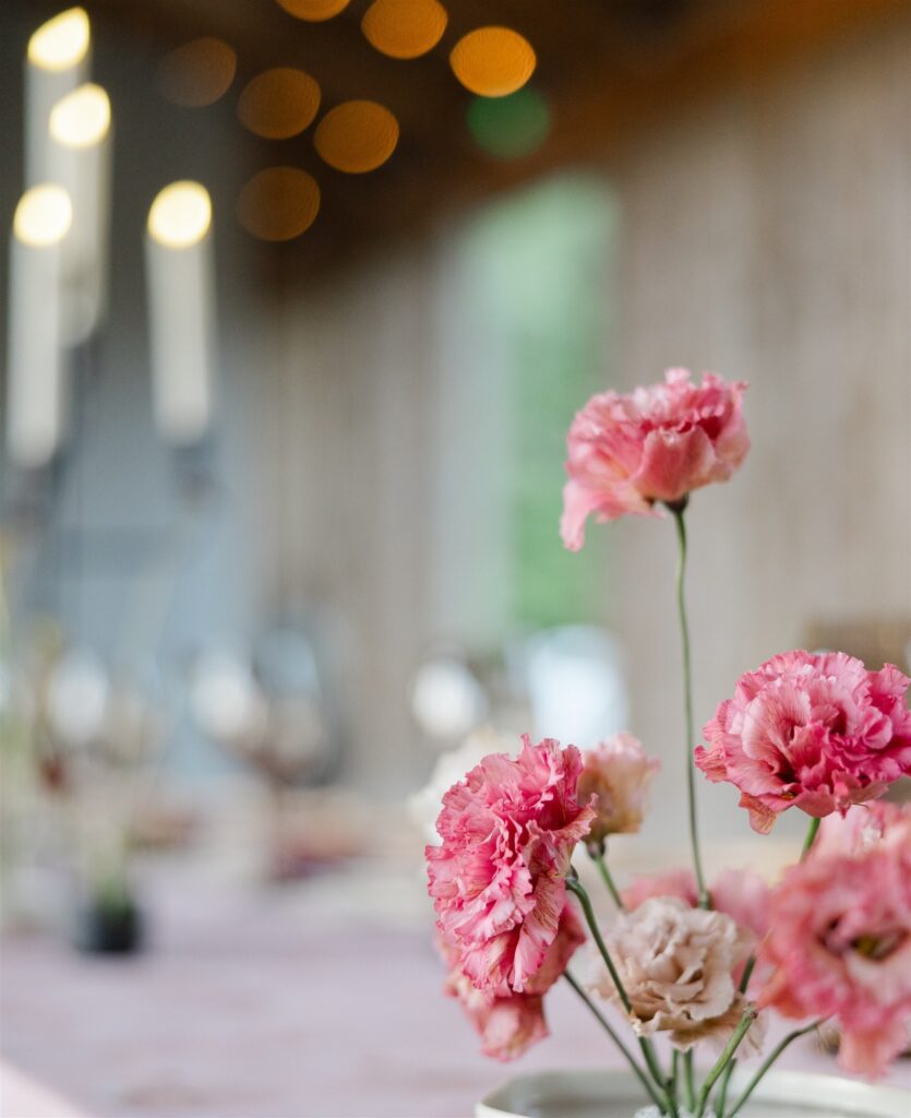 Pink flowers on elegantly set table